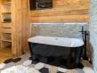 Chalet Cristal du Paradis - Schlafzimmer mit Badewanne